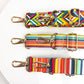 Three colorful bag straps in a row