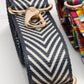 Full line of Coba purse straps in a row